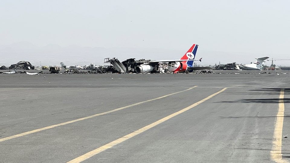 Debris of a destroyed plane lies at Sanaa International Airport, in the aftermath of an Israeli airstrike, in Sanaa, Yemen